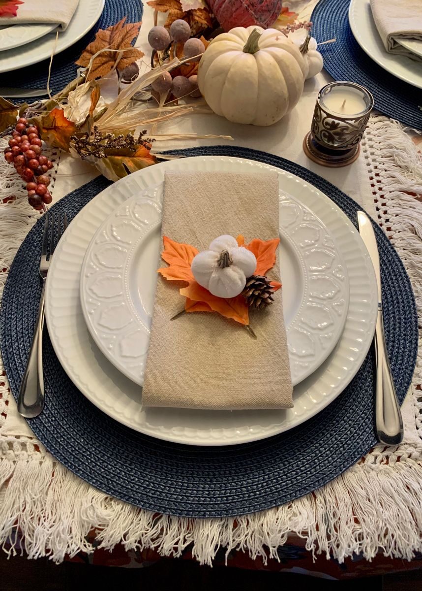 Layered traditional fall place setting for a Thanksgiving table
